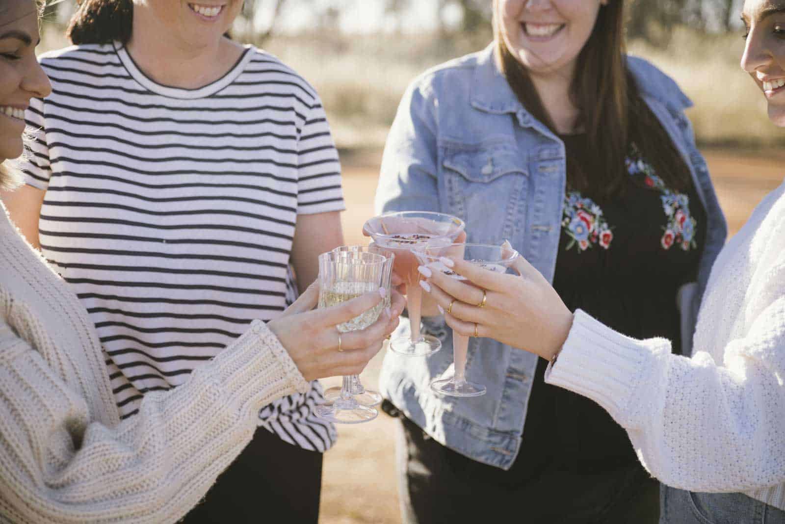 Group of young women cheerings their glasses of drinks in the Wheatbelt