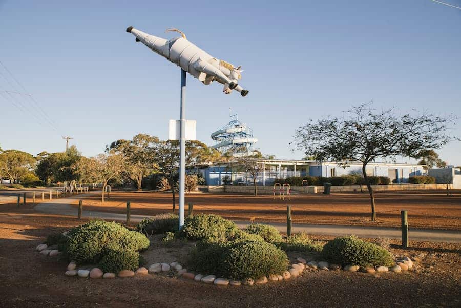 Image of tin horse sculpture flying in the air in Kulin with the Kulin Aquatic Centre in the background