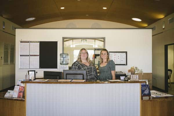 Image of 2 staff members at the visitors centre in Quairading
