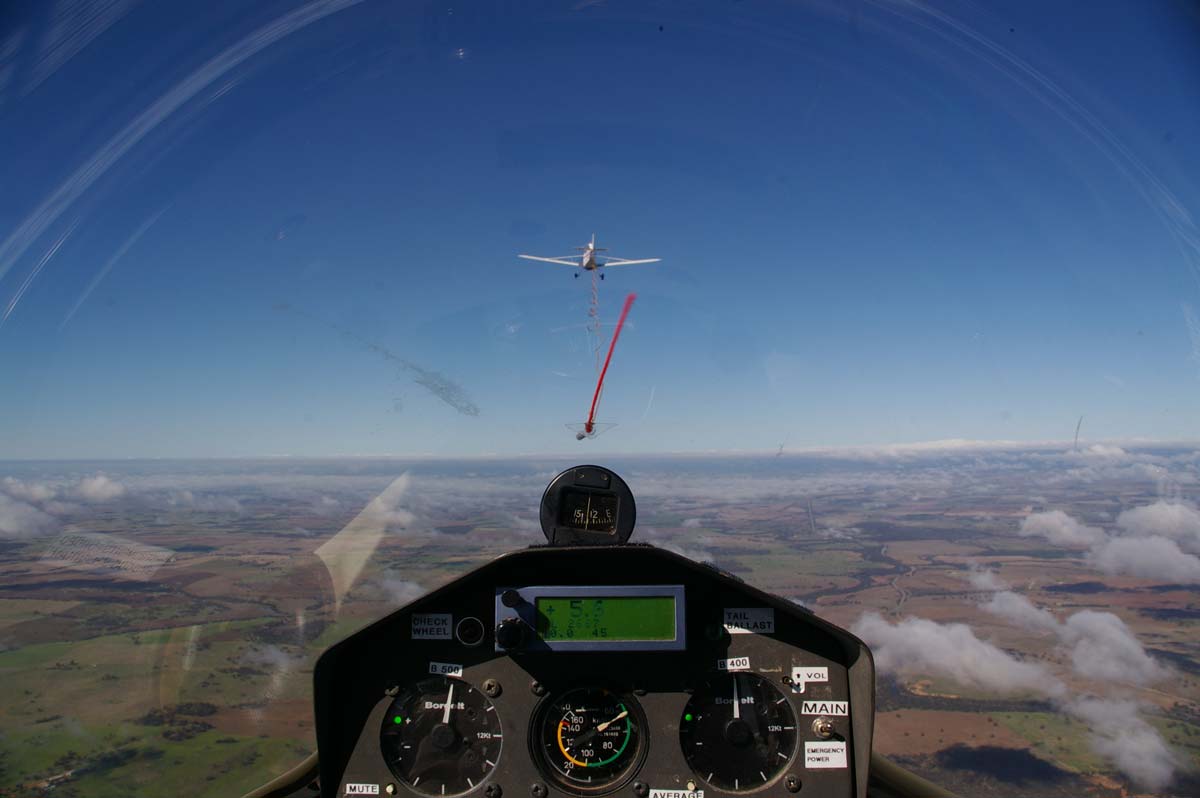 Image taken within a glider plane in the sky