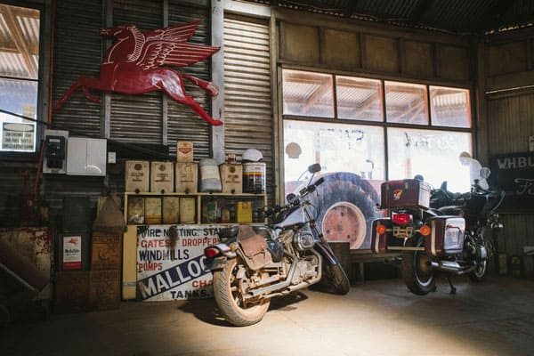 Image of old motorcycle in a shed in Kulin